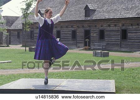 dancing, Thunder Bay, Canada, Ontario, Girl dressed in authentic costume celebrate Scottish Days by doing the Highland Dance at the Main Square at Old Fort William, Fur Trading Post, in Thunder Bay. View Large Photo Image Stock Photograph - dancing, Thunder Bay, Canada, Ontario, Girl dressed in authentic costume celebrate Scottish Days by doing the Highland Dance at the Main Square at Old Fort William, Fur Trading Post, in Thunder Bay.. Fotosearch