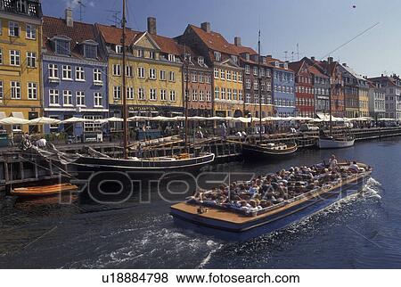 Denmark, Copenhagen, Scandinavia, Sjaelland, canal, Europe, Tour boat cruises Nyhavn (New Harbor) along the scenic city of Copenhagen View Large Photo Image Stock Photo - Denmark, Copenhagen, Scandinavia, Sjaelland, canal, Europe, Tour boat cruises Nyhavn (New Harbor) along the scenic city of Copenhagen. Fotosearch