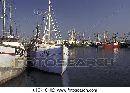 Denmark, Romo, Jylland, Scandinavia, Europe, Fishing boats docked in Havneby Harbor on the North Sea on Romo Island. View Large Photo Image Stock Image - Denmark, Romo, Jylland, Scandinavia, Europe, Fishing boats docked in Havneby Harbor on the North Sea on Romo Island.. Fotosearch
