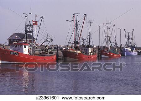 Denmark, Romo, Jylland, Scandinavia, Europe, Fishing boats docked in Havneby Harbor on the North Sea on Romo Island. View Large Photo Image Stock Image - Denmark, Romo, Jylland, Scandinavia, Europe, Fishing boats docked in Havneby Harbor on the North Sea on Romo Island.. Fotosearch