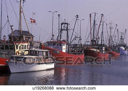 Denmark, Romo, Jylland, Scandinavia, Europe, Fishing boats docked in Havneby Harbor on the North Sea on Romo Island. View Large Photo Image Stock Photo - Denmark, Romo, Jylland, Scandinavia, Europe, Fishing boats docked in Havneby Harbor on the North Sea on Romo Island.. Fotosearch