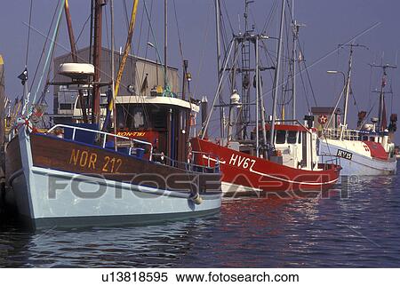 Denmark, Romo, Jylland, Scandinavia, Europe, Fishing boats docked in Havneby Harbor on the North Sea on Romo Island. View Large Photo Image Stock Photography - Denmark, Romo, Jylland, Scandinavia, Europe, Fishing boats docked in Havneby Harbor on the North Sea on Romo Island.. Fotosearch