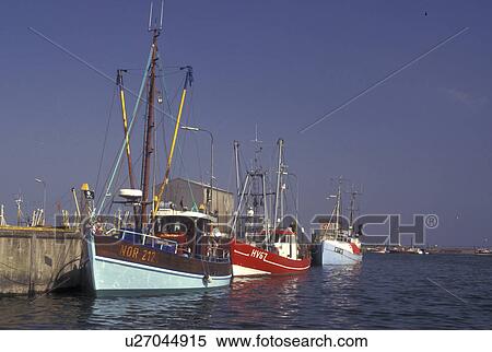 Denmark, Romo, Jylland, Scandinavia, Europe, Fishing boats docked in Havneby Harbor on the North Sea on Romo Island. View Large Photo Image Stock Photography - Denmark, Romo, Jylland, Scandinavia, Europe, Fishing boats docked in Havneby Harbor on the North Sea on Romo Island.. Fotosearch