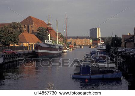 Denmark, Scandinavia, Copenhagen, Sjaelland, Europe, Boats docked along a canal along the scenic city of Copenhagen View Large Photo Image Stock Image - Denmark, Scandinavia, Copenhagen, Sjaelland, Europe, Boats docked along a canal along the scenic city of Copenhagen. Fotosearch