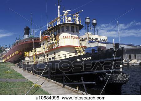 Duluth, MN, Lake Superior, Minnesota, Army Corps of Engineers Tugboat and William A. Irwin Ore Boat moored at the dock in Duluth Harbor on Lake Superior in Duluth. View Large Photo Image Stock Photography - Duluth, MN, Lake Superior, Minnesota, Army Corps of Engineers Tugboat and William A. Irwin Ore Boat moored at the dock in Duluth Harbor on Lake Superior in Duluth.. Fotosearch