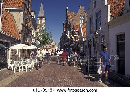 Edam, Netherlands, Holland, Noord-Holland, Europe, Outdoor cafTs and shops along a pedestrian street in the city of Edam. View Large Photo Image Stock Photo - Edam, Netherlands, Holland, Noord-Holland, Europe, Outdoor cafTs and shops along a pedestrian street in the city of Edam.. Fotosearch