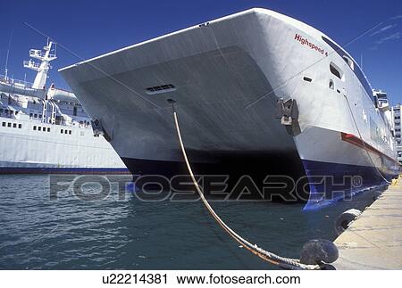 Stock Image -  ferry, Piraeus, Athens, Greece, Europe, Highspeed catamaran ferry docked at the Kentriko Limani (main ferry port) on the Great Harbour in Piraeus, one of the biggest Mediterranean Ports.. Fotosearch