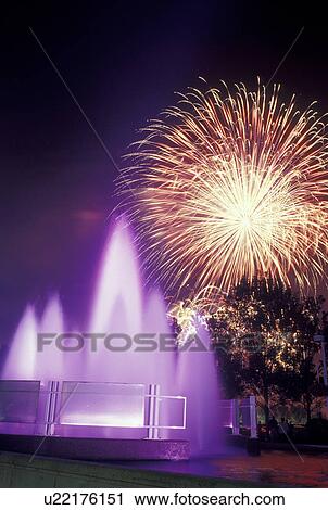 Stock Image -  fireworks, Hull, Canada, Quebec, Firework display from the colorful water fountain outside the Casino de Hull in Hull.. Fotosearch