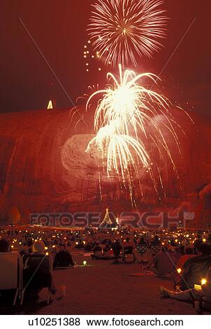 fireworks, laser show, Stone Mountain, Atlanta, GA, Georgia, Crowd of people watch the Christmas Holiday Laser Show and Fireworks Display from the lawn at Georgia's Stone Mountain Park in Stone Mountain. View Large Photo Image Stock Photo - fireworks, laser show, Stone Mountain, Atlanta, GA, Georgia, Crowd of people watch the Christmas Holiday Laser Show and Fireworks Display from the lawn at Georgia's Stone Mountain Park in Stone Mountain.. Fotosearch