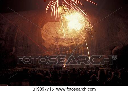 fireworks, laser show, Stone Mountain, Atlanta, GA, Georgia, Crowd of people watch the Christmas Holiday Laser Show and Fireworks Display from the lawn at Georgia's Stone Mountain Park in Stone Mountain. View Large Photo Image Stock Photography - fireworks, laser show, Stone Mountain, Atlanta, GA, Georgia, Crowd of people watch the Christmas Holiday Laser Show and Fireworks Display from the lawn at Georgia's Stone Mountain Park in Stone Mountain.. Fotosearch