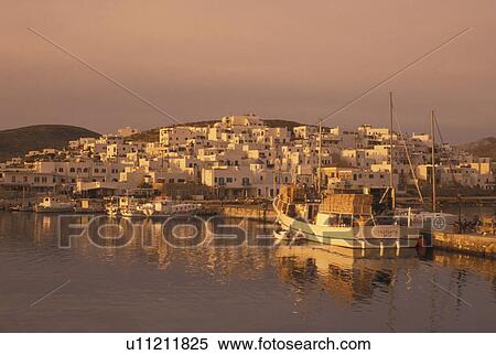 Stock Photography -  fishing boat, Paros, Greece, Greek Islands, Naoussa, Cyclades, Europe, Fishing boats docked in Naoussa Harbor on Paros Island on the Aegean Sea.. Fotosearch