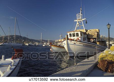 Stock Image -  fishing boat, Paros, Greek Islands, Parikia, Cyclades, Greece, Europe, Fishing boats docked in the harbor of Parikia on Paros Island on the Aegean Sea.. Fotosearch