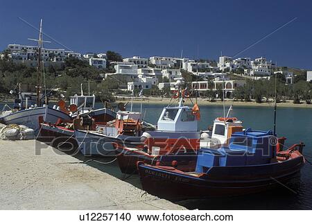 fishing boats, Paros, Greek Islands, Cyclades, Greece, Europe, Colorful fishing boats docked in the harbor of Piso Livadi on Paros Island on the Aegean Sea. View Large Photo Image Stock Image - fishing boats, Paros, Greek Islands, Cyclades, Greece, Europe, Colorful fishing boats docked in the harbor of Piso Livadi on Paros Island on the Aegean Sea.. Fotosearch