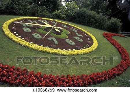 Stock Photo -  floral clock, Geneva, Switzerland, Flower Clock at Jardin Anglais in Geneva.. Fotosearch