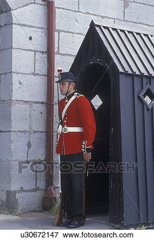 fort, guard, Kingston, Canada, Ontario, Sentry guard stands at his post outside Fort Henry National Historic Site in Kingston. View Large Photo Image Stock Photo - fort, guard, Kingston, Canada, Ontario, Sentry guard stands at his post outside Fort Henry National Historic Site in Kingston.. Fotosearch