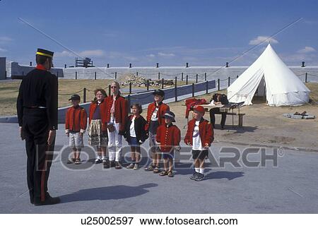Fort Henry, Kingston, Canada, Ontario, Soldier gives a military drill with children at Fort Henry National Historic Site in Kingston. View Large Photo Image Stock Photo - Fort Henry, Kingston, Canada, Ontario, Soldier gives a military drill with children at Fort Henry National Historic Site in Kingston.. Fotosearch