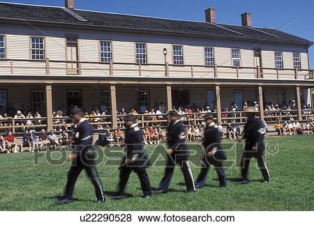 Stock Photo -  Fort Mackinac, Mackinac Island, MI, Lake Huron, Michigan, Mackinac Island State Park, Demonstration on Parade Ground outside Soldier's Barracks at Fort Mackinac on Mackinac Island.. Fotosearch