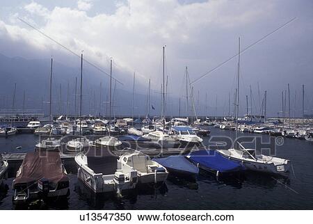 France, Aix-Les-Bains, Savoie, Rhone-Alpes, Europe, Boats docked at the marina in the harbor on Lac du Bourget in the spa resort town of Aix-les-Bains. View Large Photo Image Stock Image - France, Aix-Les-Bains, Savoie, Rhone-Alpes, Europe, Boats docked at the marina in the harbor on Lac du Bourget in the spa resort town of Aix-les-Bains.. Fotosearch