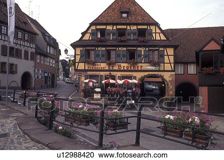 Stock Image -  France, Alsace, Barr, Bas-Rhin, Europe, wine region, Outdoor cafT in the picturesque village of Barr in the wine region of Alsace.. Fotosearch