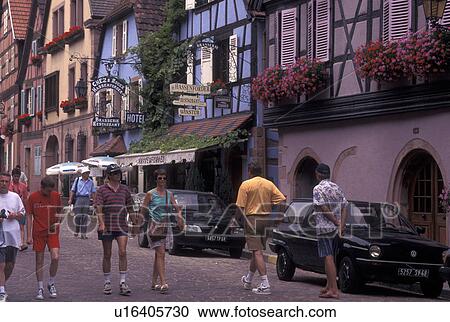France, Alsace, Kaysersberg, Haut-Rhin, Europe, wine region, People shopping along the narrow cobblestone pedestrian streets surrounded by half-timbered buildings in the picturesque village of Kaysersberg in the wine region of Alsace. View Large Photo Image Stock Image - France, Alsace, Kaysersberg, Haut-Rhin, Europe, wine region, People shopping along the narrow cobblestone pedestrian streets surrounded by half-timbered buildings in the picturesque village of Kaysersberg in the wine region of Alsace.. Fotosearch