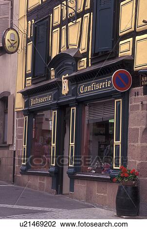 Stock Image -  France, Alsace, Ribeauville, Haut-Rhin, Europe, wine region, Patisserie (pastry shop) and Confiserie (chocolate shop) in the village of Ribeauville in the wine region of Alsace.. Fotosearch