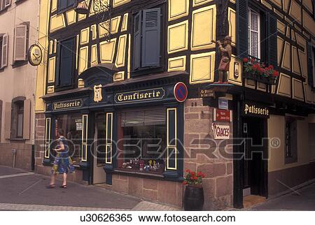 Stock Photography -  France, Alsace, Ribeauville, Haut-Rhin, Europe, wine region, Patisserie (pastry shop) and Confiserie (chocolate shop) in the village of Ribeauville in the wine region of Alsace.. Fotosearch