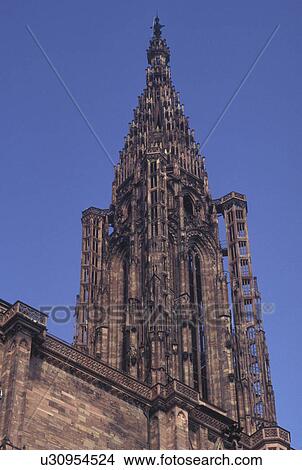 France, Alsace, Strasbourg, Bas-Rhin, Europe, cathedral, wine region, The steeple of Notre Dame Cathedral in the city of Strasbourg, the capital of Bas-Rhin, in the wine region of Alsace. View Large Photo Image Picture -  France, Alsace, Strasbourg, Bas-Rhin, Europe, cathedral, wine region, The steeple of Notre Dame Cathedral in the city of Strasbourg, the capital of Bas-Rhin, in the wine region of Alsace.. Fotosearch