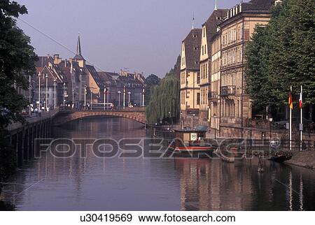 France, Alsace, Strasbourg, Bas-Rhin, Europe, wine region, Buildings along the Ill River in the city of Strasbourg, the capital of Bas-Rhin, in the wine region of Alsace. View Large Photo Image Stock Photo - France, Alsace, Strasbourg, Bas-Rhin, Europe, wine region, Buildings along the Ill River in the city of Strasbourg, the capital of Bas-Rhin, in the wine region of Alsace.. Fotosearch