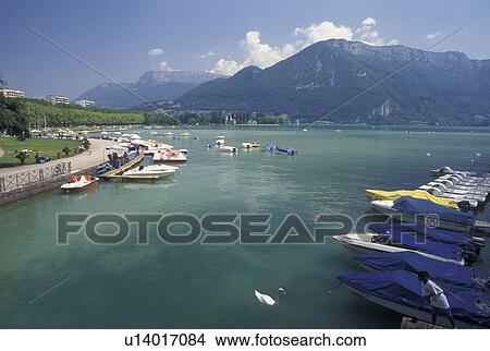 France, Annecy, Haute-Savoie, Rhone-Alpes, Europe, Lakeside park on scenic Lake Annecy (Lac d' Annecy) surrounded by mountains in Annecy. View Large Photo Image Picture - France, Annecy, Haute-Savoie, Rhone-Alpes, Europe, Lakeside park on scenic Lake Annecy (Lac d' Annecy) surrounded by mountains in Annecy. . Fotosearch