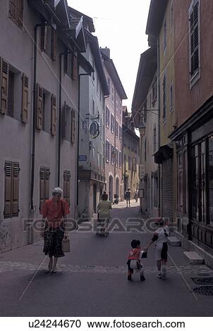 France, Annecy, Haute-Savoie, Rhone-Alpes, Europe, Shops along a narrow pedestrian street in the old town of Annecy. View Large Photo Image Stock Image - France, Annecy, Haute-Savoie, Rhone-Alpes, Europe, Shops along a narrow pedestrian street in the old town of Annecy. . Fotosearch