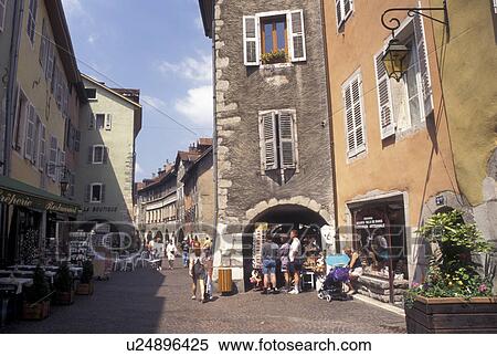 Stock Photography -  France, Annecy, Haute-Savoie, Rhone-Alpes, Europe, Shops along a narrow pedestrian street in the old town of Annecy. . Fotosearch