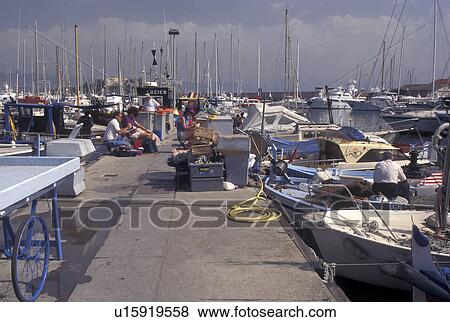 France, Antibes, Cote d' Azur, Provence, Alpes-Maritimes, Europe, Fishing boats and pleasure boats docked in Port Vauban Harbor on the Mediterranean Sea in the city of Antibes. View Large Photo Image Stock Photo - France, Antibes, Cote d' Azur, Provence, Alpes-Maritimes, Europe, Fishing boats and pleasure boats docked in Port Vauban Harbor on the Mediterranean Sea in the city of Antibes. . Fotosearch