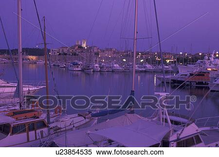 France, Antibes, Cote d' Azur, Provence, harbor, Alpes-Maritimes, Europe, Boats docked in Port Vauban Harbor on the Mediterranean Sea in the city of Antibes in the evening. View Large Photo Image Stock Photography - France, Antibes, Cote d' Azur, Provence, harbor, Alpes-Maritimes, Europe, Boats docked in Port Vauban Harbor on the Mediterranean Sea in the city of Antibes in the evening.. Fotosearch