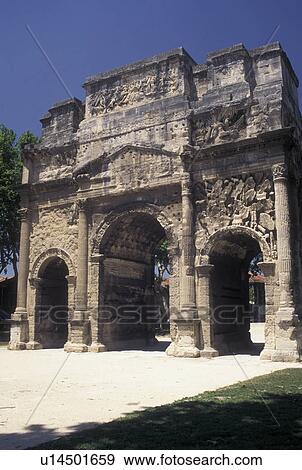 Stock Photo -  France, arch, Orange, Vaucluse, Provence, Europe, Arc de Triomphe the Roman triumphal arch in the city of Orange.. Fotosearch