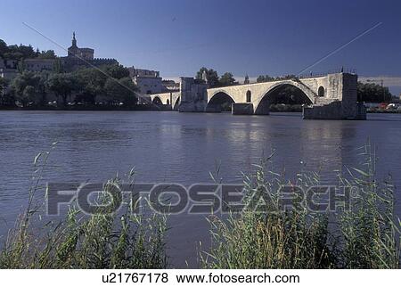France, Avignon, Provence, Vaucluse, Europe, 12th century Pont St-Benezet on the Rhone River in Avignon. A popular old children's song was named after the bridge 'sur le pont d'Avignon'. View Large Photo Image Stock Photo - France, Avignon, Provence, Vaucluse, Europe, 12th century Pont St-Benezet on the Rhone River in Avignon. A popular old children's song was named after the bridge 'sur le pont d'Avignon'.. Fotosearch