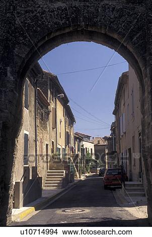 Picture -  France, Chateau-Neuf-du-Pape, Provence, Vaucluse, Europe, Archway in the village of Chateau-Neuf-du-Pape in Provence.. Fotosearch