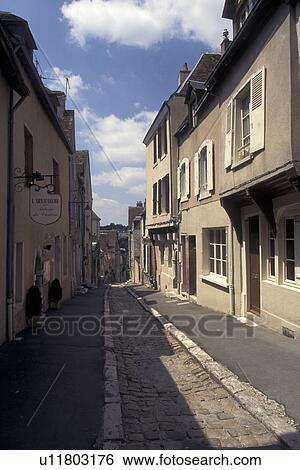 France, Chateaudun, Eure-et-Loir, Europe, Shops along a narrow street in the town of Chateaudun. View Large Photo Image Stock Photograph - France, Chateaudun, Eure-et-Loir, Europe, Shops along a narrow street in the town of Chateaudun.. Fotosearch