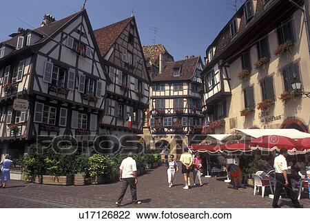 France, Colmar, Alsace, Haut-Rhin, Europe, outdoor cafT, wine region, Half-timbered buildings decorated with colorful flowers in the picturesque town of Colmar, capital of Haut-Rhin, in the wine region of Alsace. View Large Photo Image Stock Image - France, Colmar, Alsace, Haut-Rhin, Europe, outdoor cafT, wine region, Half-timbered buildings decorated with colorful flowers in the picturesque town of Colmar, capital of Haut-Rhin, in the wine region of Alsace.. Fotosearch