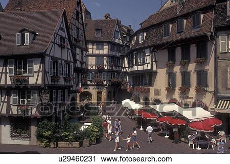 France, Colmar, Alsace, Haut-Rhin, Europe, outdoor cafT, wine region, Half-timbered buildings decorated with colorful flowers in the picturesque town of Colmar, capital of Haut-Rhin, in the wine region of Alsace. View Large Photo Image Stock Image - France, Colmar, Alsace, Haut-Rhin, Europe, outdoor cafT, wine region, Half-timbered buildings decorated with colorful flowers in the picturesque town of Colmar, capital of Haut-Rhin, in the wine region of Alsace.. Fotosearch