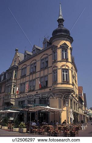 Stock Photo -  France, Colmar, Alsace, Haut-Rhin, Europe, outdoor cafT, wine region, Half-timbered buildings in the picturesque town of Colmar, capital of Haut-Rhin, in the wine region of Alsace.. Fotosearch