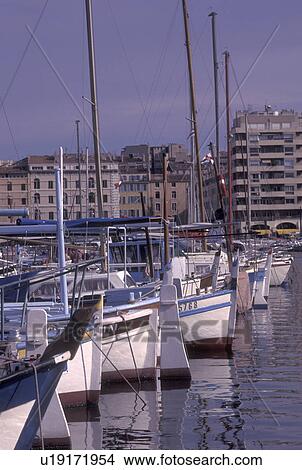 France, harbor, Marseille, Provence, Cote d' Azur, Bouche-du-Rhone, Marseilles, Europe, Boats docked at the marina in Vieux Port in the city of Marseille on the Mediterranean Sea. View Large Photo Image Picture - France, harbor, Marseille, Provence, Cote d' Azur, Bouche-du-Rhone, Marseilles, Europe, Boats docked at the marina in Vieux Port in the city of Marseille on the Mediterranean Sea.. Fotosearch