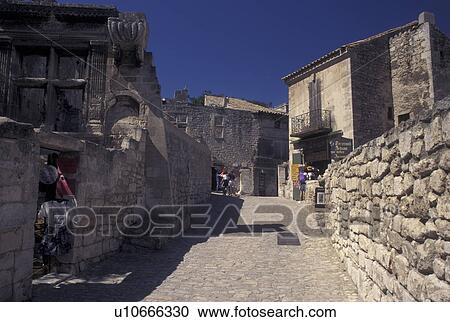 France, Les Baux de Provence, Bouche-du-Rhone, Provence, Europe, Shops along a narrow cobbled street in the medieval village of Les Baux de Provence. View Large Photo Image Stock Image - France, Les Baux de Provence, Bouche-du-Rhone, Provence, Europe, Shops along a narrow cobbled street in the medieval village of Les Baux de Provence.. Fotosearch