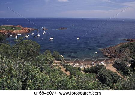 France, Massif de l' Esterel, Cote d' Azur, Provence, Var, Europe, Scenic view of Corniche de l' Esterel, red rocky coast, on the Mediterranean Sea. View Large Photo Image Stock Photo - France, Massif de l' Esterel, Cote d' Azur, Provence, Var, Europe, Scenic view of Corniche de l' Esterel, red rocky coast, on the Mediterranean Sea.. Fotosearch