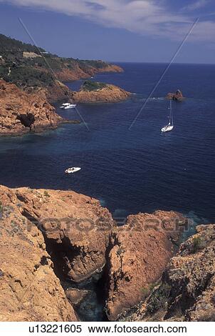 France, Massif de l' Esterel, Cote d' Azur, Provence, Var, Europe, Scenic view of Corniche de l' Esterel, red rocky coast, on the Mediterranean Sea. View Large Photo Image Stock Photography - France, Massif de l' Esterel, Cote d' Azur, Provence, Var, Europe, Scenic view of Corniche de l' Esterel, red rocky coast, on the Mediterranean Sea.. Fotosearch