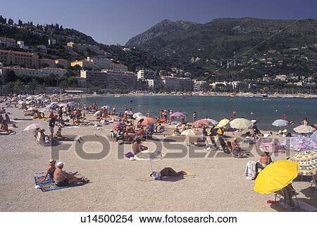 France, Menton, Cote d' Azur, Alpes-Maritimes, Europe, A view of the beach along the Mediterranean Sea in the city of Menton. View Large Photo Image Picture - France, Menton, Cote d' Azur, Alpes-Maritimes, Europe, A view of the beach along the Mediterranean Sea in the city of Menton.. Fotosearch