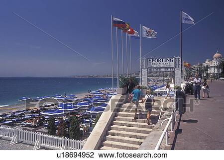 France, Nice, Cote d' Azur, Provence, Alpes-Maritimes, Europe, Sporting Restaurant along the Promenade des Anglais on the beach along the Mediterranean Sea in the city of Nice. View Large Photo Image Stock Image - France, Nice, Cote d' Azur, Provence, Alpes-Maritimes, Europe, Sporting Restaurant along the Promenade des Anglais on the beach along the Mediterranean Sea in the city of Nice.. Fotosearch