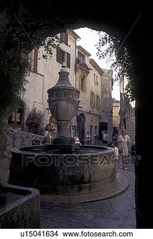 France, St. Paul de Vence, Cote d' Azur, Provence, Alpes-Maritimes, Europe, Fountain from an archway in the hilltop village of Saint Paul de Vence. View Large Photo Image Picture - France, St. Paul de Vence, Cote d' Azur, Provence, Alpes-Maritimes, Europe, Fountain from an archway in the hilltop village of Saint Paul de Vence.. Fotosearch