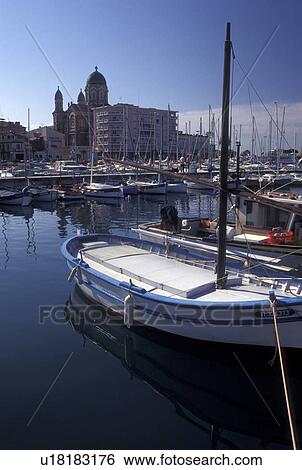 Stock Photograph -  France, St. Raphael, Cote d' Azur, Provence, Var, Europe, Colorful fishing boats docked at the marina in the harbor of Saint Raphael on the Mediterranean Sea.. Fotosearch