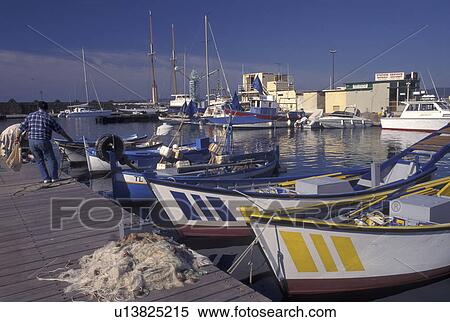 France, St. Raphael, harbor, Cote d' Azur, Provence, Var, Europe, Colorful fishing boats docked at the marina in the harbor of Saint Raphael on the Mediterranean Sea. View Large Photo Image Stock Photography - France, St. Raphael, harbor, Cote d' Azur, Provence, Var, Europe, Colorful fishing boats docked at the marina in the harbor of Saint Raphael on the Mediterranean Sea.. Fotosearch