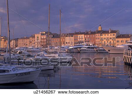 France, St. Tropez, Cote d' Azur, Provence, harbor, Var, Europe, Yachts docked in the harbor of Saint Tropez at sunset on the Mediterranean Sea. View Large Photo Image Stock Photo - France, St. Tropez, Cote d' Azur, Provence, harbor, Var, Europe, Yachts docked in the harbor of Saint Tropez at sunset on the Mediterranean Sea.. Fotosearch